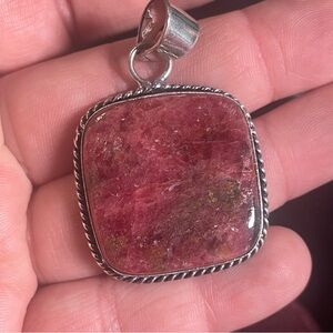 Rhodinite crystal pendant